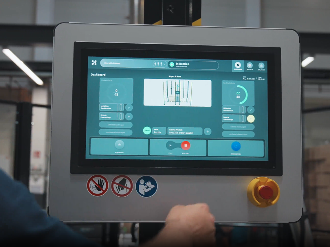 Industrial touchscreen HMI displaying palletizing system dashboard